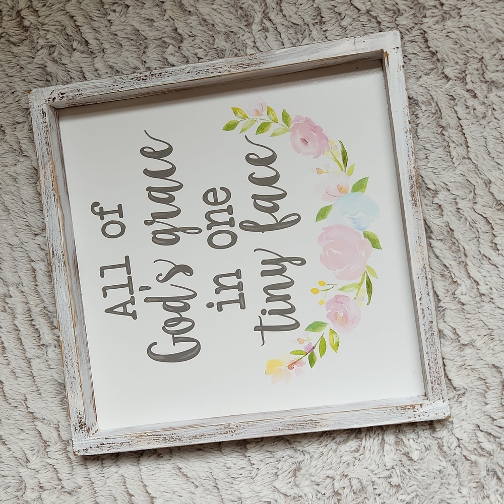 “All of God’s grace in one tiny face” wooden wall decor